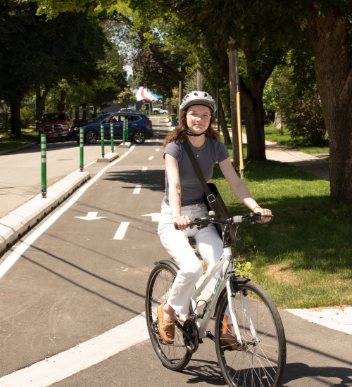 women biking on two lane bike lane