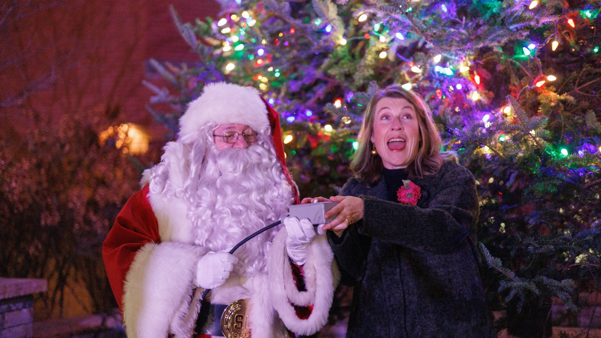 Mayor Kate with Santa Claus in front of tree