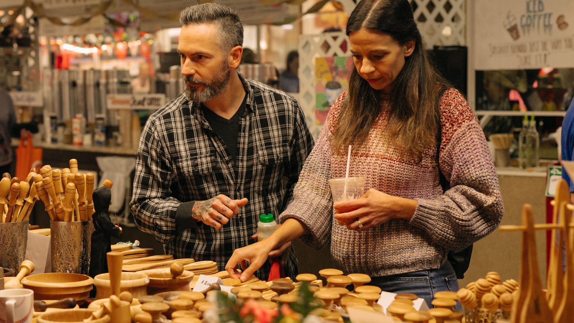 Man and woman shopping at Holiday Market