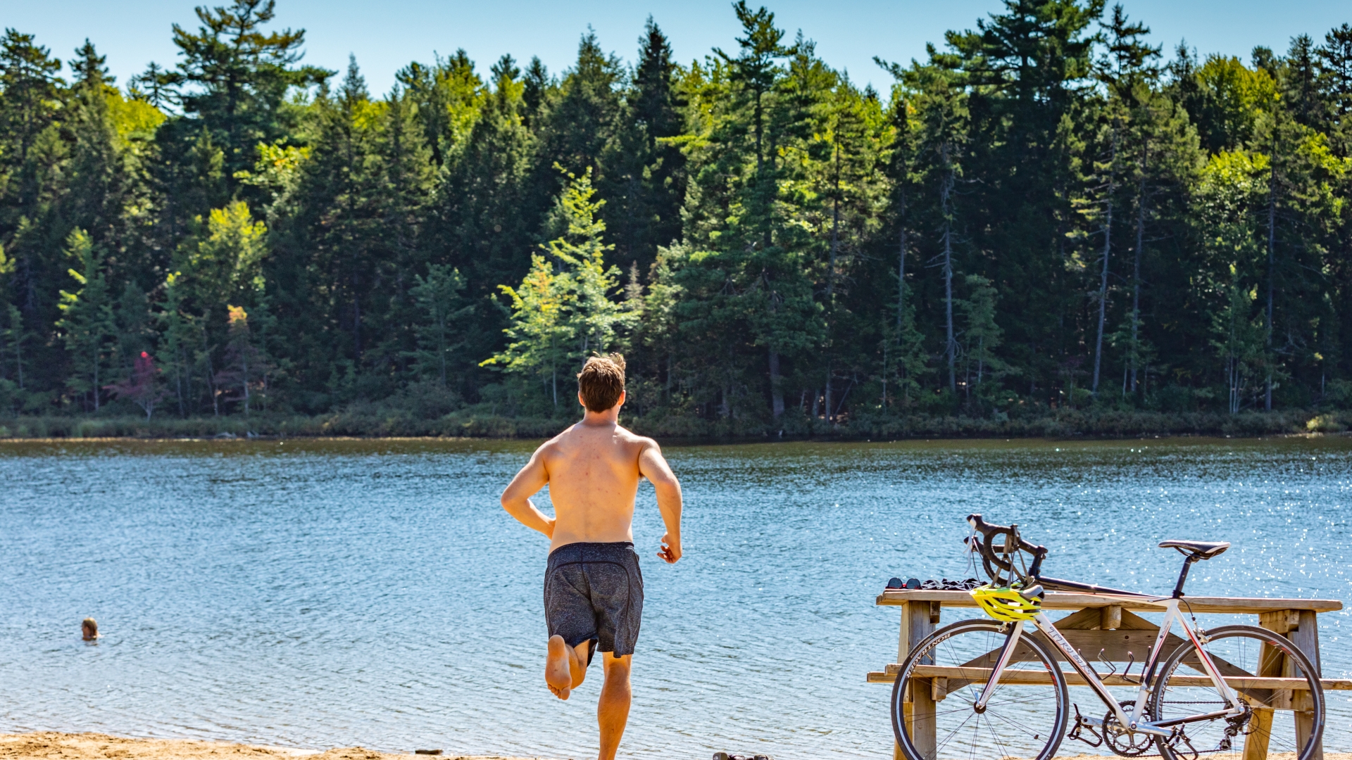 Person running to Killarney Lake