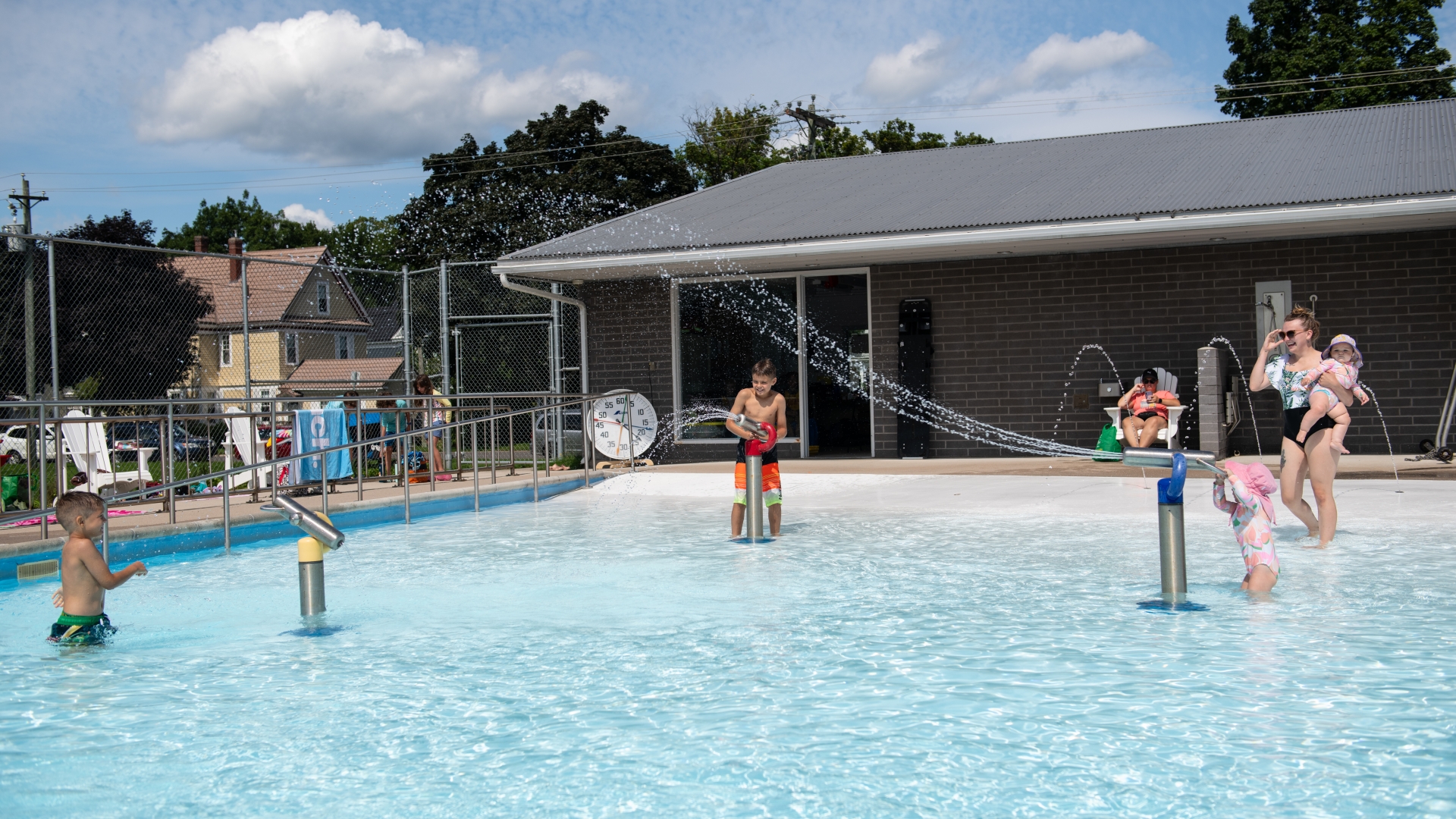 Kids playing in outdoor pool