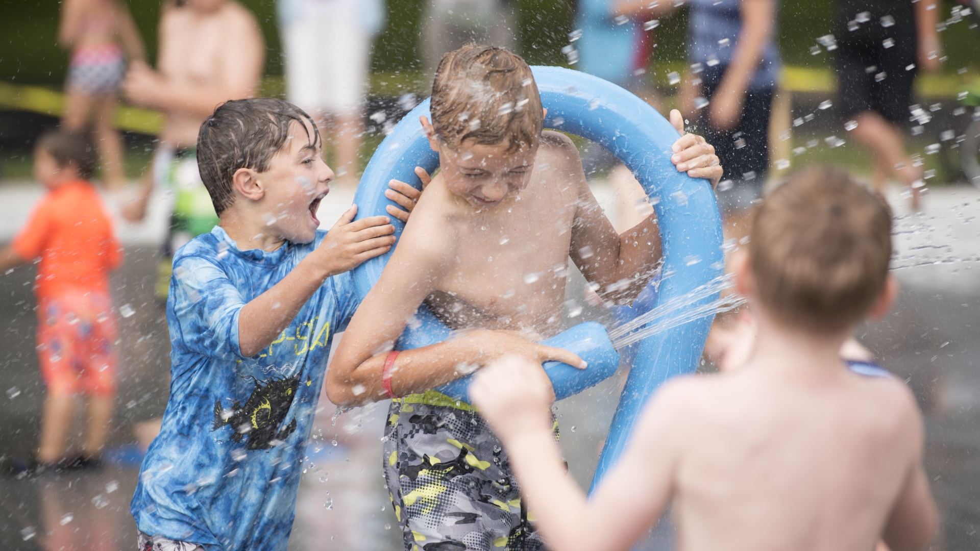 Children playing at splash pad