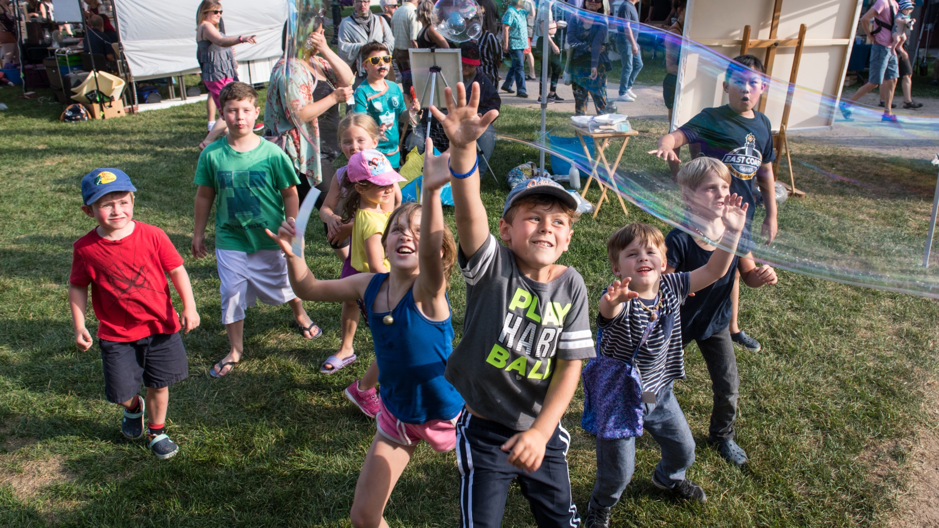 Kids playing with bubbles