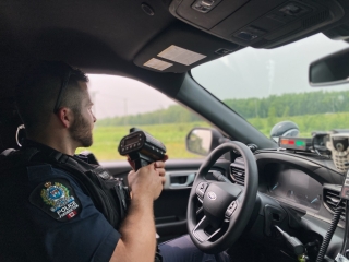 Police officer with radar gun