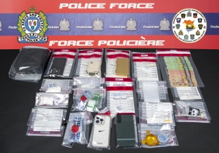 Image of drugs and currency seized during arrest