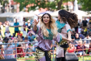 A group of women dancing on stage