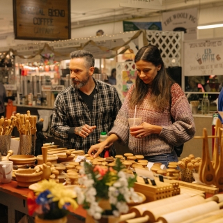 Man and woman shopping at Holiday Market
