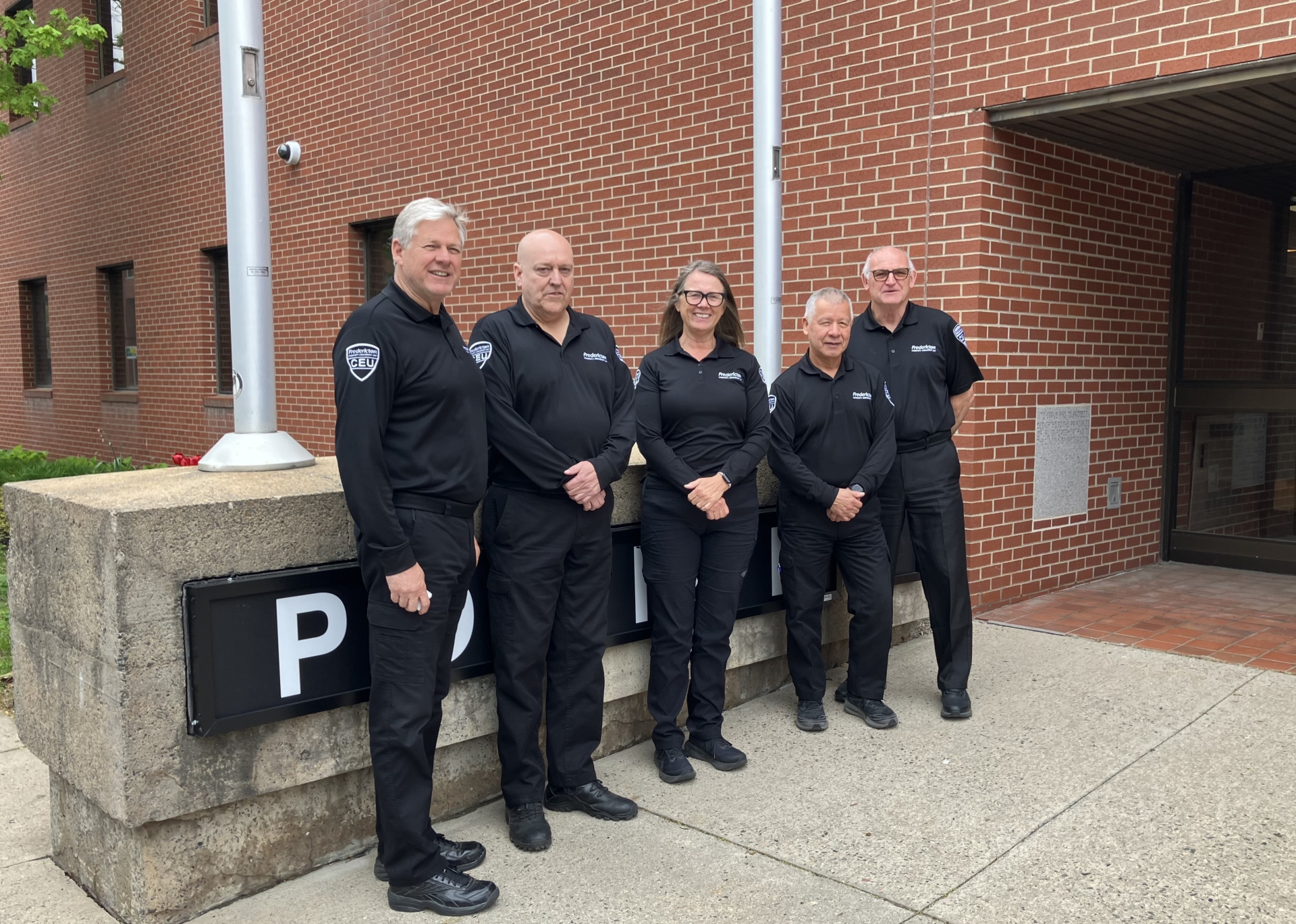 Caption: Members of the Fredericton Police Force’s Community Engagement Unit (CEU) have now been on the job for four months, and have managed 376 files, and saved front-line officers approx.. 750 hours in administrative work. Pictured: CEU members Stephen Horsman, Andrew Miller, Joan Crane, Ron Franics, John Lally. Missing from photo: Andrea Sullivan
